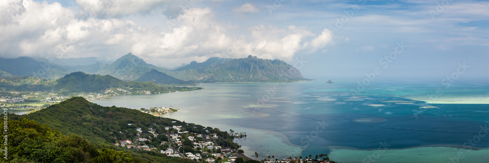 Scenic day seascape panorama of Kaneohe Bay and Kualoa Ridge in the distance. Oahu, Hawaii, USA. Scenic day seascape panorama of Kaneohe Bay and Kualoa Ridge in the distance. Oahu, Hawaii, USA.