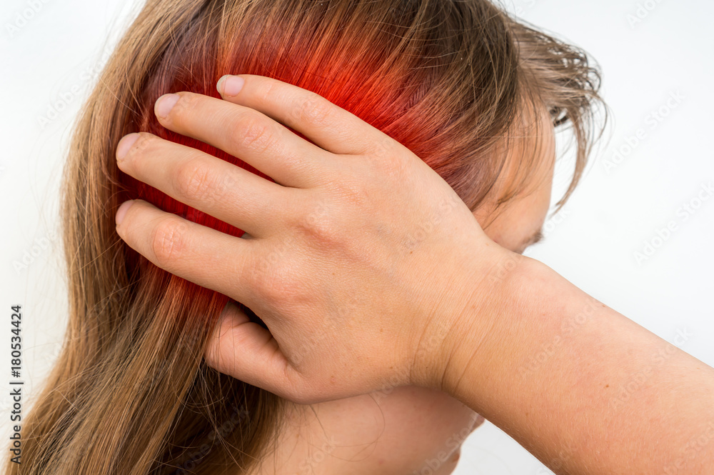 Woman with earache is holding her aching ear Woman with earache is holding her aching ear