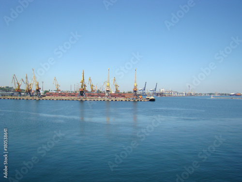 Shipyards in the port against the blue sea