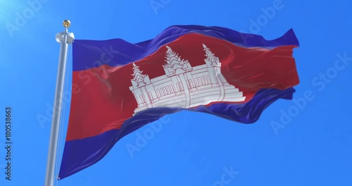 Cambodia flag waving at wind in slow with blue sky, loop photo