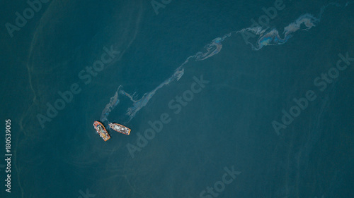 Fishing boats and oil spill
