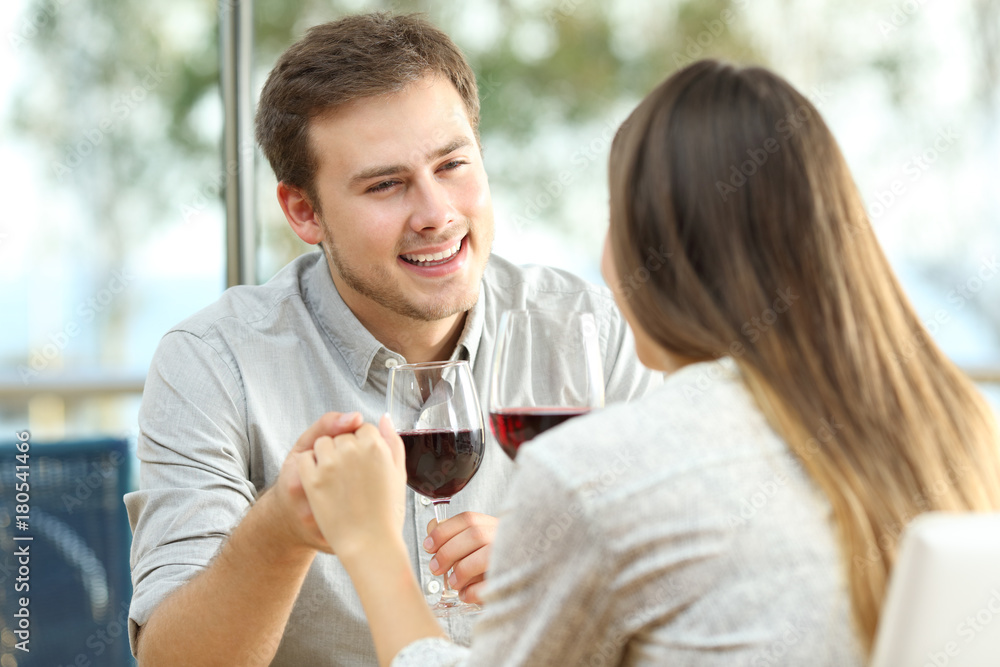 Successful date of a couple in a restaurant Successful date of a couple in a restaurant
