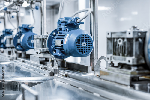Canvastavla Electric motors on steel tanks for mixing liquids, modern production of alcoholic beverages