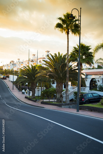 Street of the little tropical city in the sunset © gargantiopa
