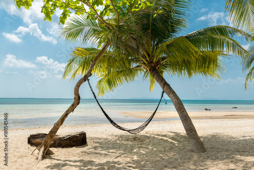 Fototapeta Naklejka Na Ścianę i Meble -  Hammock and palms on the beach resort at Koh Samui Island Thailand