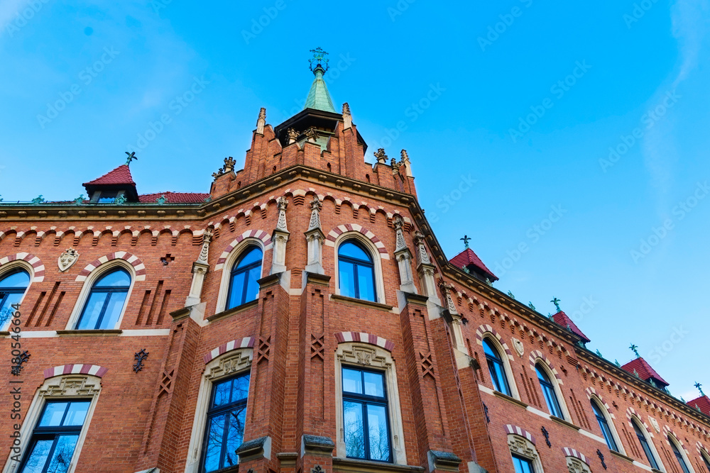 Architecture of Krakow, Poland against blue sky