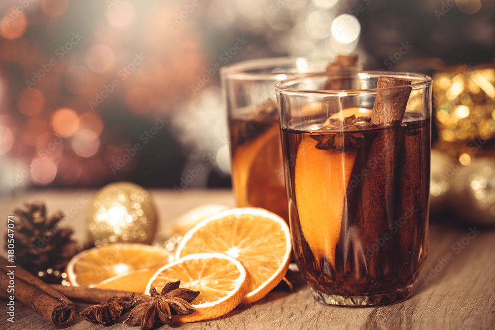 The Mulled wine in night celebration of New Year party and delicious Christmas drink for autumn and winter season The Mulled wine in night celebration of New Year party and delicious Christmas drink for autumn and winter season