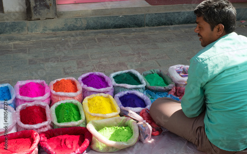 Obraz na płótnie Street seller in Kathmandu selling Rangoli powder for Diwali w salonie