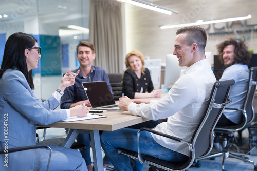 Startup Business Team At A Meeting at modern office building
