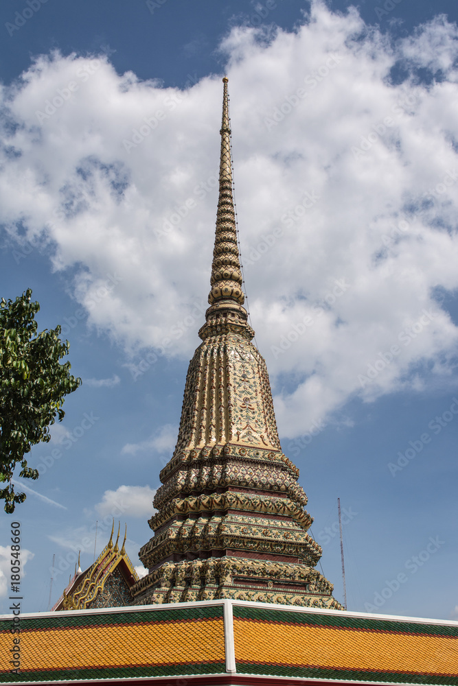 Pagoda is in Wat Pho that was named as the temple of the pagoda or chedi that are decorated with yellow glaze or glazed tiles or dark blue Pagoda is in Wat Pho that was named as the temple of the pagoda or chedi that are decorated with yellow glaze or glazed tiles or dark blue
