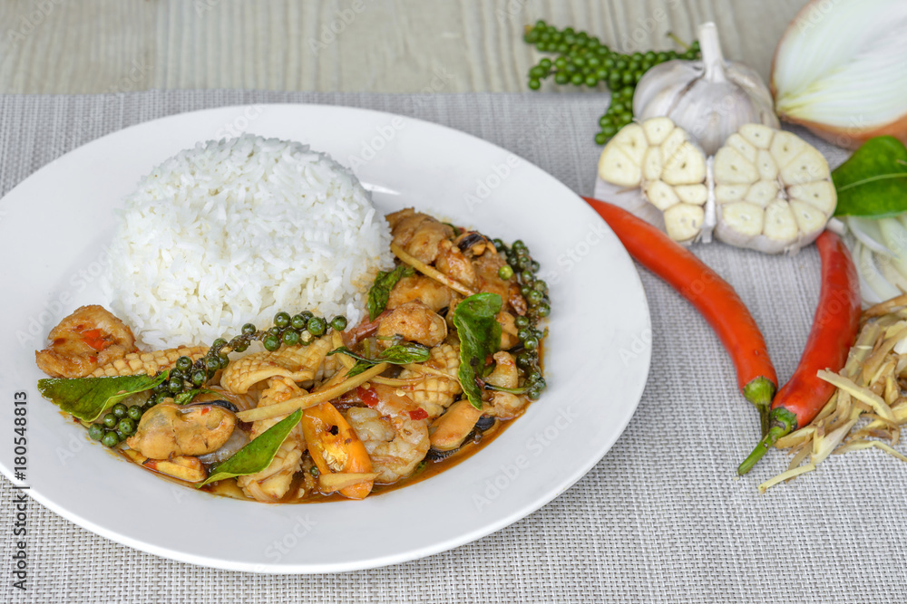 Seafoods cooked with thai spicy paste and thai harb