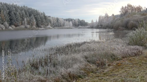 Panorama of lake in the autumn frost. The Village Bugrovo, Pushkinskie Mountains. Russia  photo