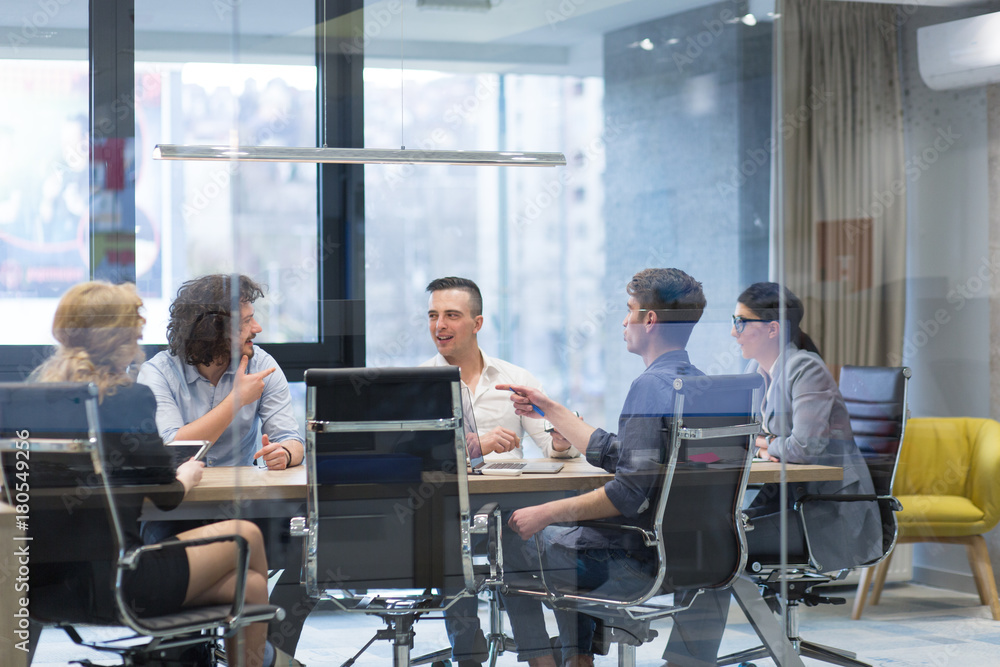 Startup Business Team At A Meeting at modern office building