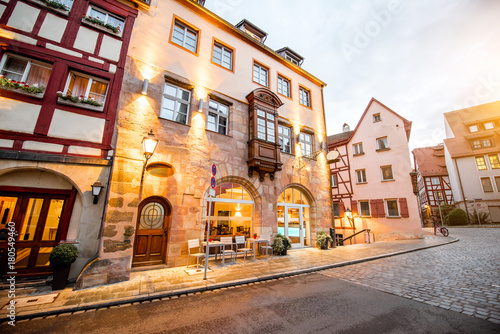 Night street view on the old illuminated buildings in Nurnberg city, Germany