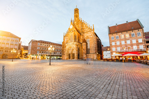 Night view on the illuminated market square with old cathedral in Nurnberg city, Germany