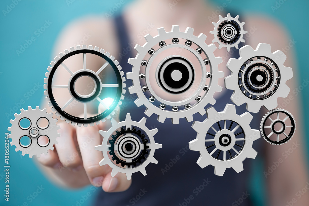 Businesswoman using floating gear icons 3D rendering Businesswoman using floating gear icons 3D rendering
