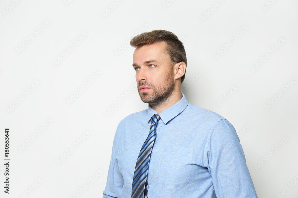 Attractive man in formal suit on white background Attractive man in formal suit on white background