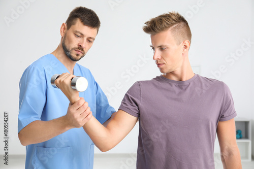 Physiotherapist working wit...