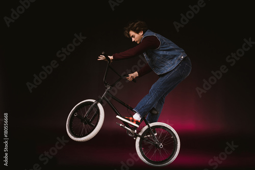 bmx cyclist performing stunt