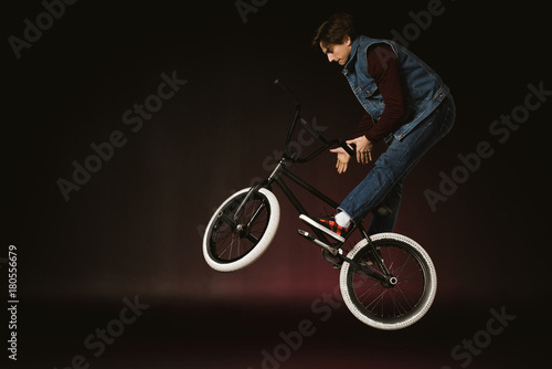 bmx cyclist performing stunt