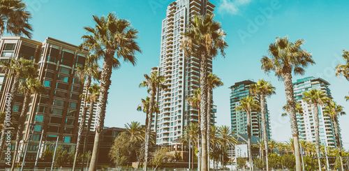 SAN DIEGO - JULY 29, 2017: Modern buildings of San Diego skyline. San Diego attracts 20 million people annually