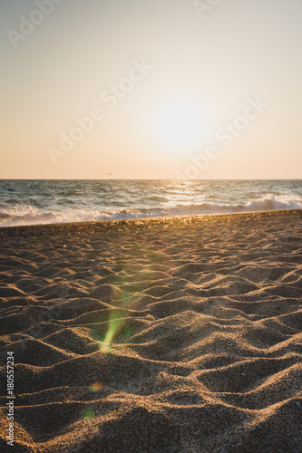 Evening beach at sunset in summer