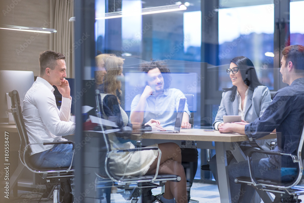 Startup Business Team At A Meeting at modern office building