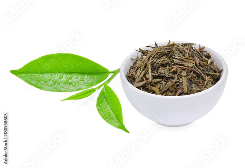 Green tea leaves with dried tea leaves isolated on white background.
