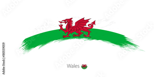 Flag of Wales in rounded grunge brush stroke.