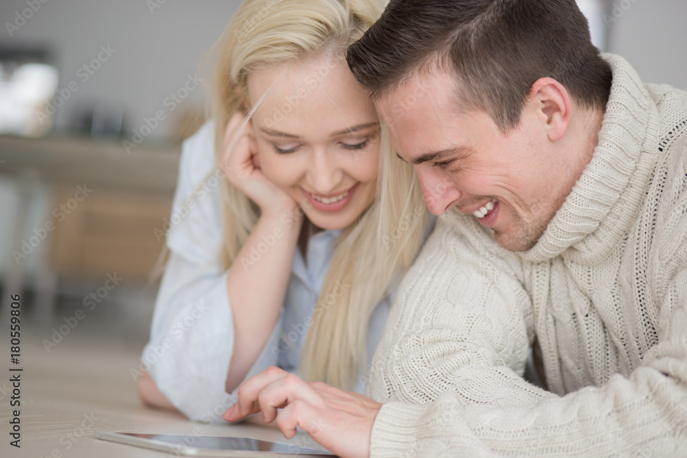 Young Couple using digital tablet on cold winter day Young Couple using digital tablet on cold winter day