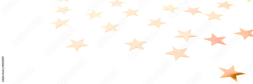 Colorful shiny stars on a white background, copy space