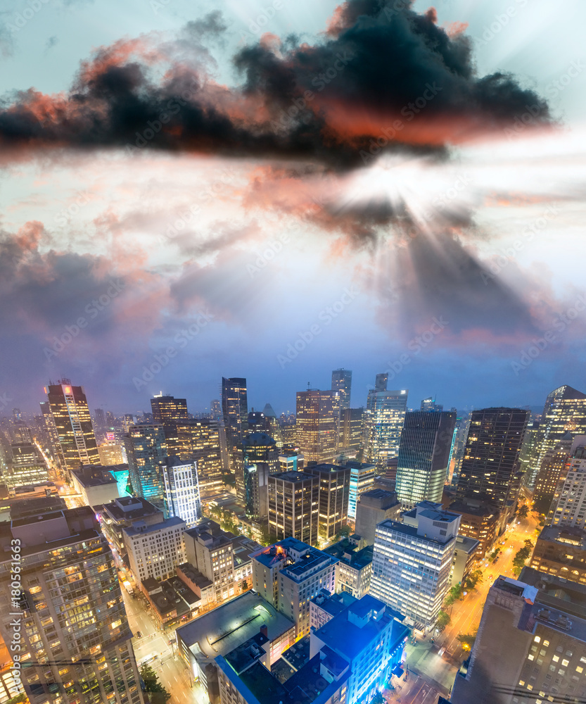 Fototapeta premium Sunset over Vancouver skyline, Canada. Aerial view