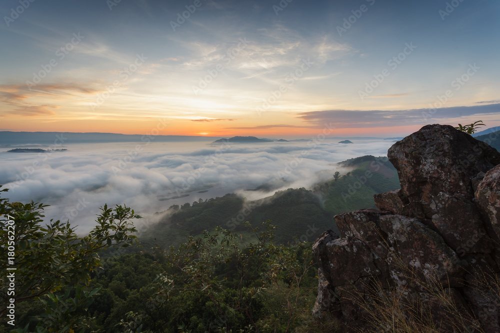 Fog on the mountain. morning fog in the mountains. beautiful landscape with mountain view and morning fog on sunrise. amazing natural background. Sunrise   of dense fog, thailand.