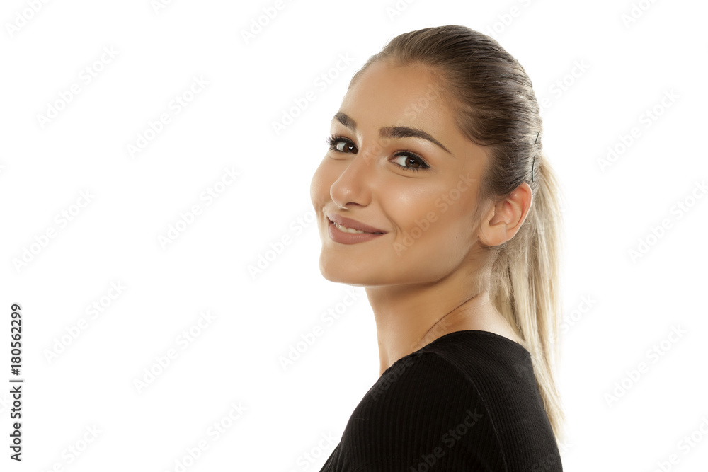 Portrait of a beautiful smiling teen girl on white background Portrait of a beautiful smiling teen girl on white background