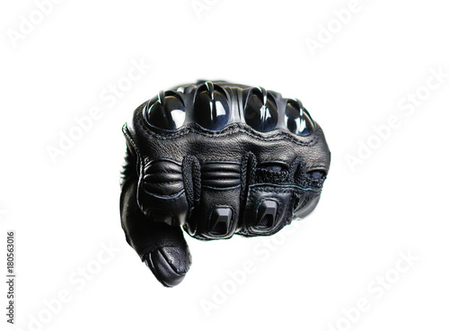 The fist in the glove. Sport black Moto gloves. Isolated on white background