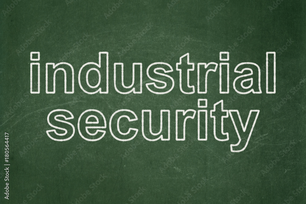 Fototapeta premium Privacy concept: text Industrial Security on Green chalkboard background