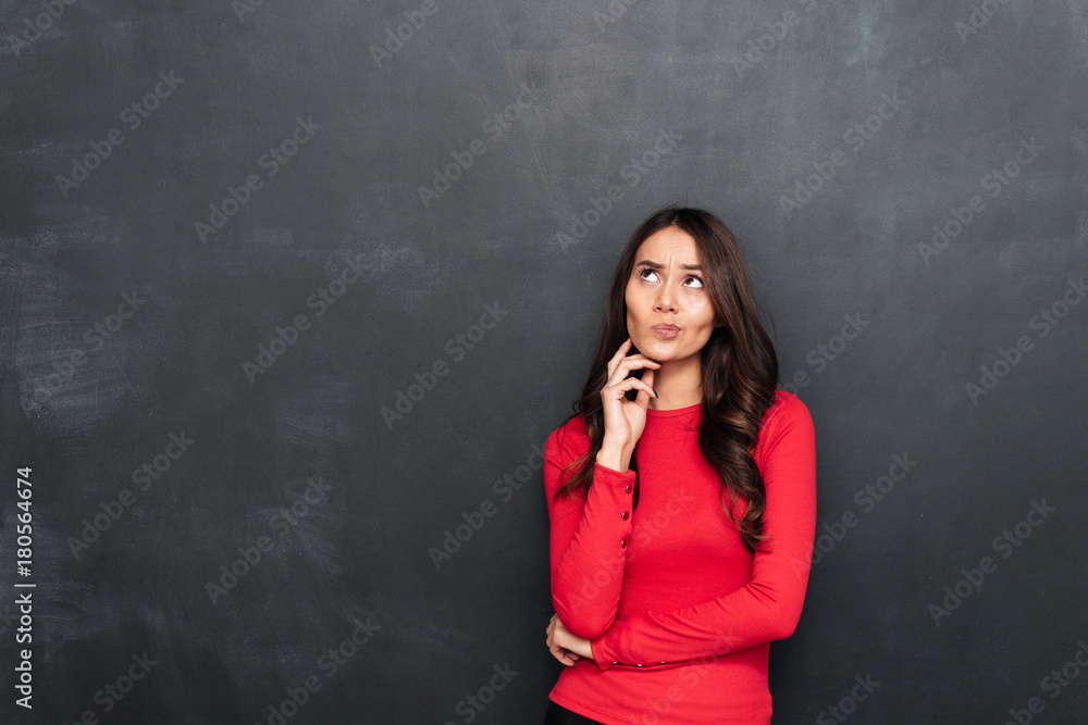 Thoughtful young beautiful woman looking aside. Thoughtful young beautiful woman looking aside.