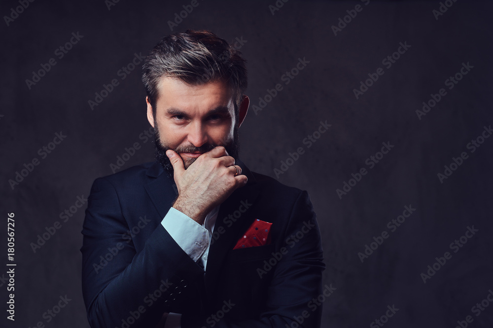 A man dressed in an elegant suit.