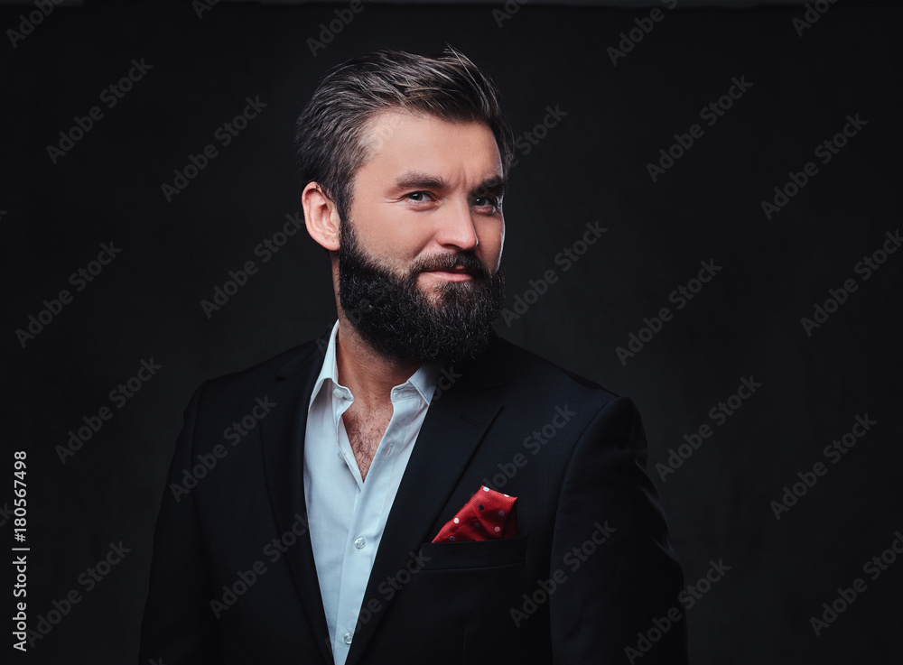 A man dressed in an elegant suit. A man dressed in an elegant suit.