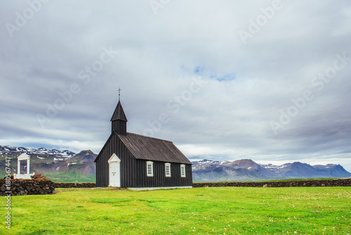 Mountain View Iceland. Beautiful black wooden church in Budir