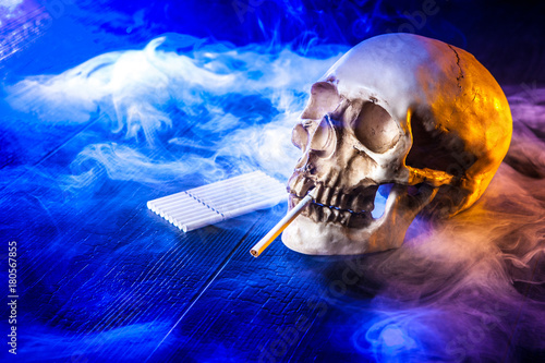 The skull smokes cigarettes...