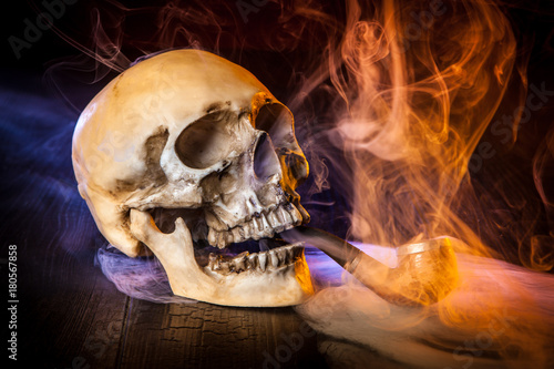A skull with a smoking pipe...