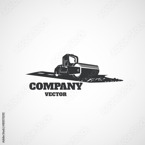 Compactor rides on the asphalt.
