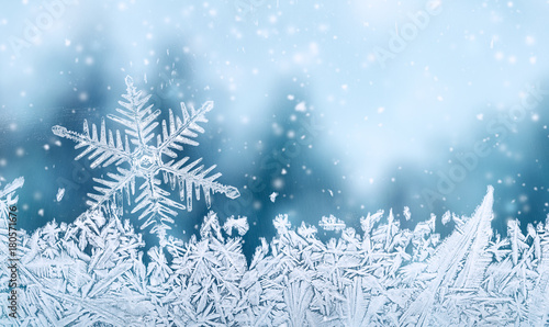 Christmas background - snowflake on window