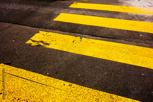 pedestrians lines in yellow colors on darken ground © Robert Herhold