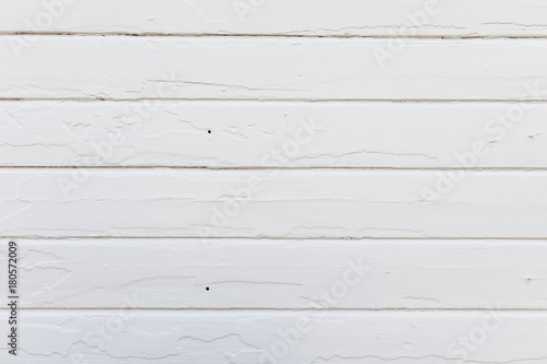 Fototapeta Naklejka Na Ścianę i Meble -  Old white wood planks on an old house wall. Newly painted. texture