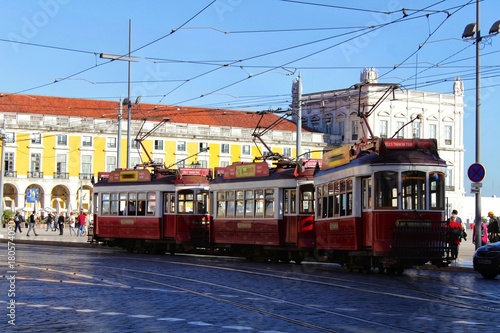 Colorful trams through the streets of Lisbon in Autumn