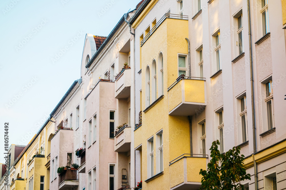 pink and yellow facaded houses in berlin