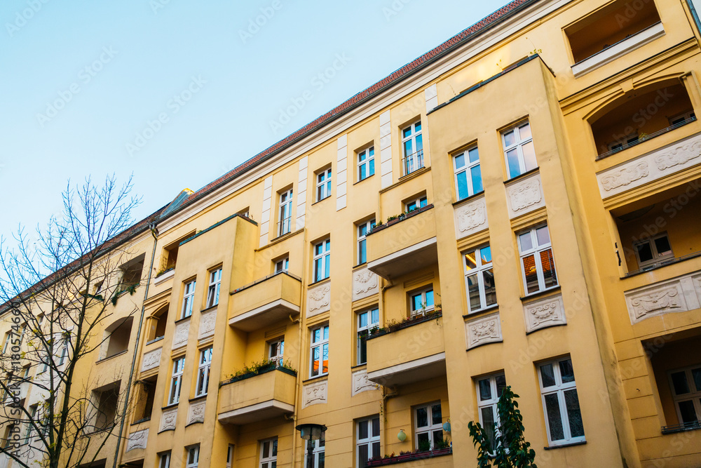 typical residential building in prenzlauer berg with orange facade