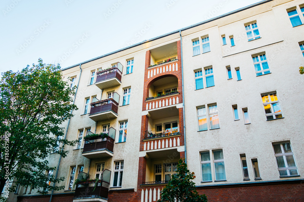 Naklejka premium white and orange plattenbau house